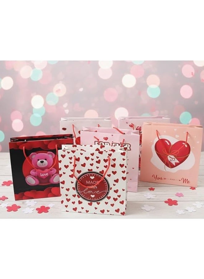 شنطة هدايا أنيقة وعصرية بأشكال مختلفة لجميع المناسبات – تصميم فاخر، متينة وعملية، مثالية لتقديم الهدايا بطريقة راقية وجذابة مقاس 18*18 سم (3 قطع ) - Image 3